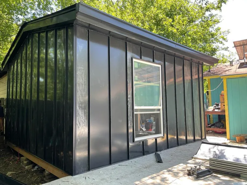 Black standing seam metal wall panels for Metal Roof Installation in West Salem