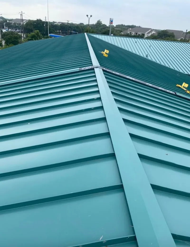 Green commercial metal roof ridge and valley for Metal Roof Repair in West Salem
